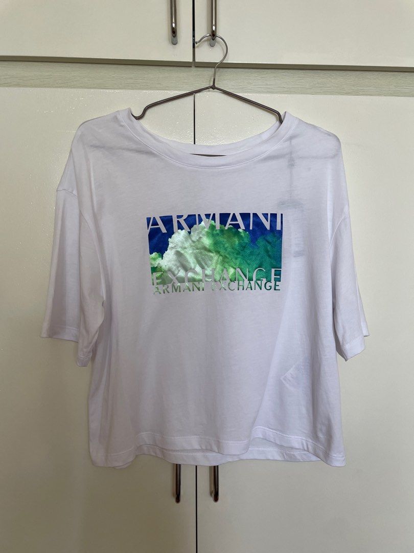AUTHENTIC Armani Exchange White Cotton Shirt (Category: Shirts) located in Pasig City. Submitted by restyle_collection (Listing ID 1370805432, Image 3). Description: The original price was 170 USD. This was purchased in the U.S. The shirt comes with the Authenticity Tag. It is not that see through as compared to the picture. The lighting in the room is just a bit bright. Open for negotiation. .