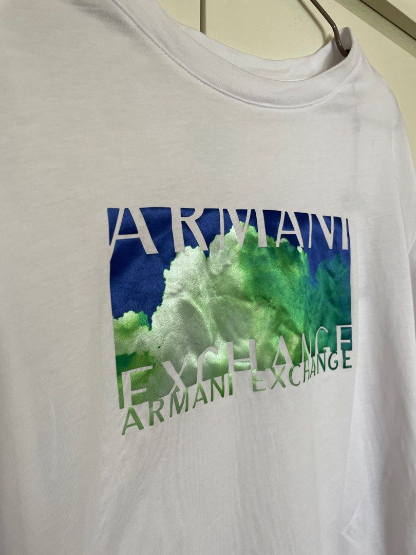 AUTHENTIC Armani Exchange White Cotton Shirt (Category: Shirts) located in Pasig City. Submitted by restyle_collection (Listing ID 1370805432, Image 1). Description: The original price was 170 USD. This was purchased in the U.S. The shirt comes with the Authenticity Tag. It is not that see through as compared to the picture. The lighting in the room is just a bit bright. Open for negotiation. .