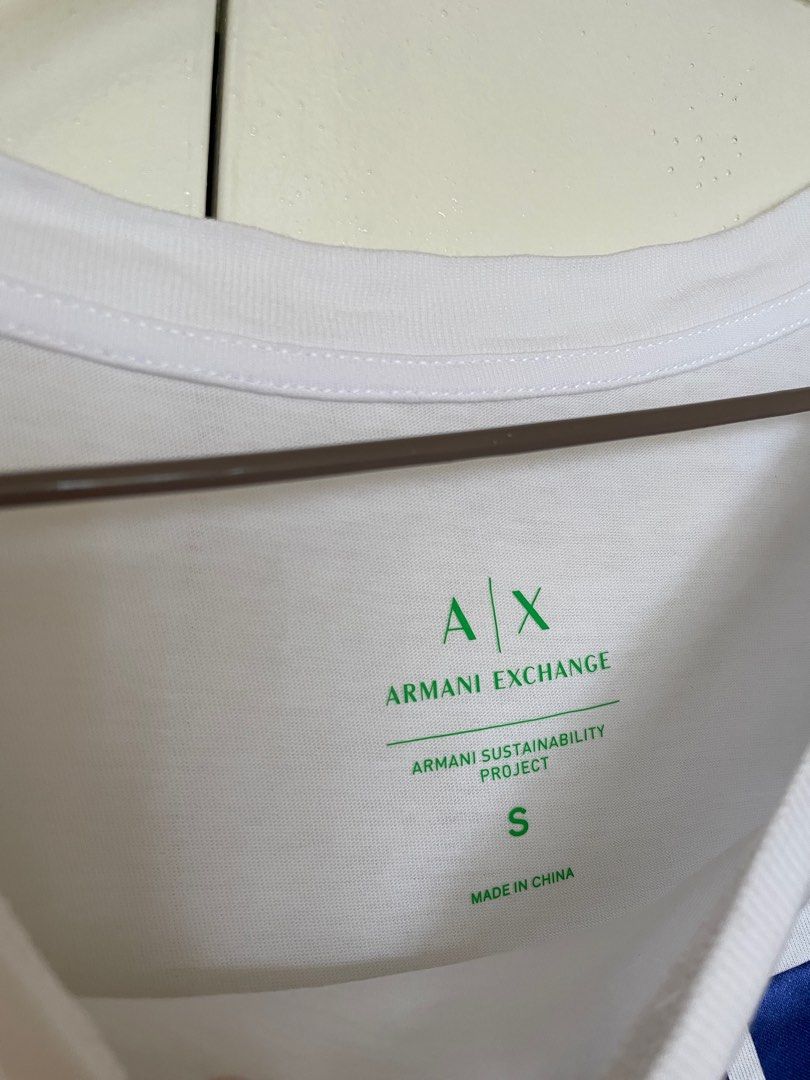 AUTHENTIC Armani Exchange White Cotton Shirt (Category: Shirts) located in Pasig City. Submitted by restyle_collection (Listing ID 1370805432, Image 2). Description: The original price was 170 USD. This was purchased in the U.S. The shirt comes with the Authenticity Tag. It is not that see through as compared to the picture. The lighting in the room is just a bit bright. Open for negotiation. .