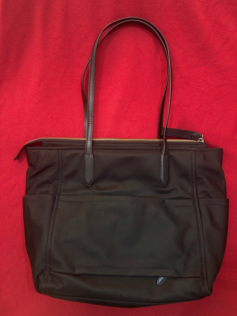 Authentic Kate Spade Chelsea Large (Category: Luxury Bags & Wallets) located in Meycauayan. Submitted by clarissem (Listing ID 1357927356, Image 2). Description: Style Number KC527 Measurements Length: 6.75” Height: 12.25” Width: 13.4”w (bottom) 17.2”w (top) Materials 100% Recycled Nylon Smooth PVC trim Handle Handle Drop:12.00 Features Top zip pocket Front slip back zip pocket Front credit card Slots Drop in top zip closure Key leash Fits larges