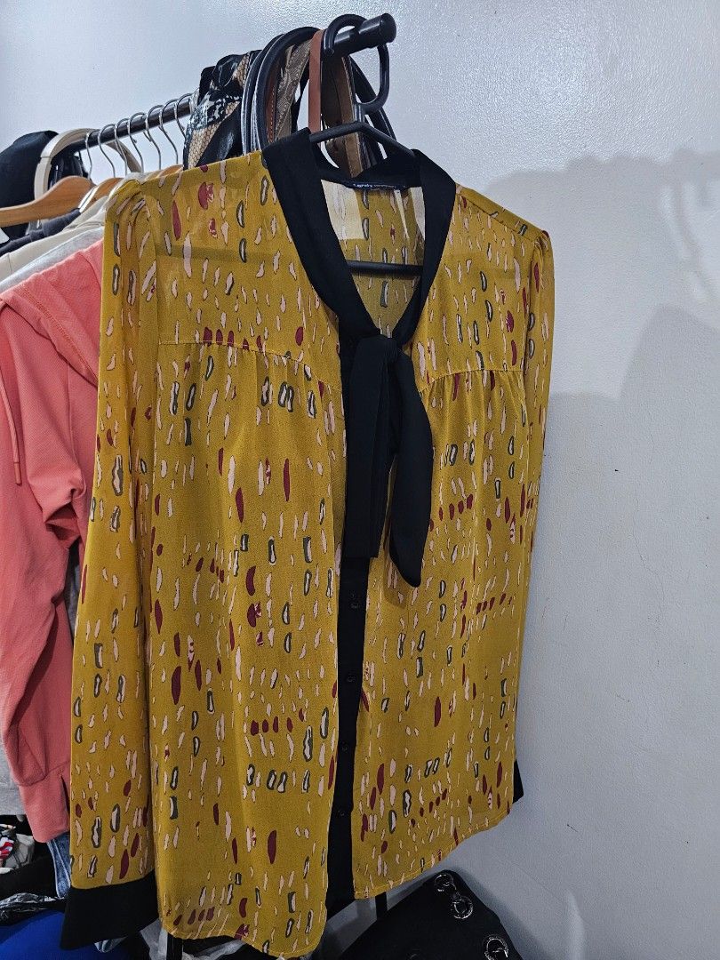 Candy Yellow office top (Category: Longsleeves) located in Makati City. Submitted by kathsclosetdeclutter (Listing ID 1370958695, Image 1). Description: office top. no major flaws may loose stitches lang..
