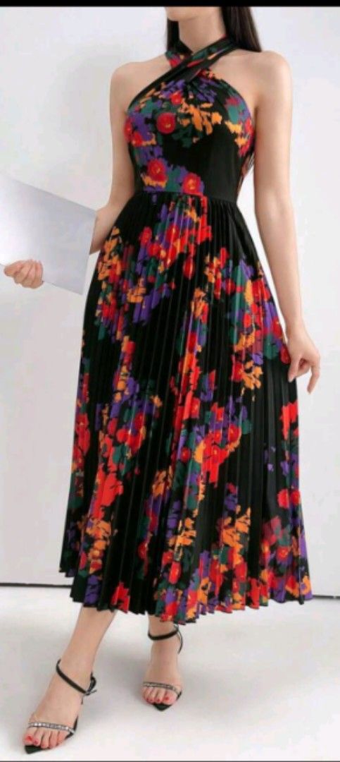 Floral haltered and pleated dress (Category: Dresses) located in Quezon City. Submitted by faramiza (Listing ID 1370857061, Image 2). Description: never used. namali ng size very nice in actual medium size ₱750 pa to sa app.