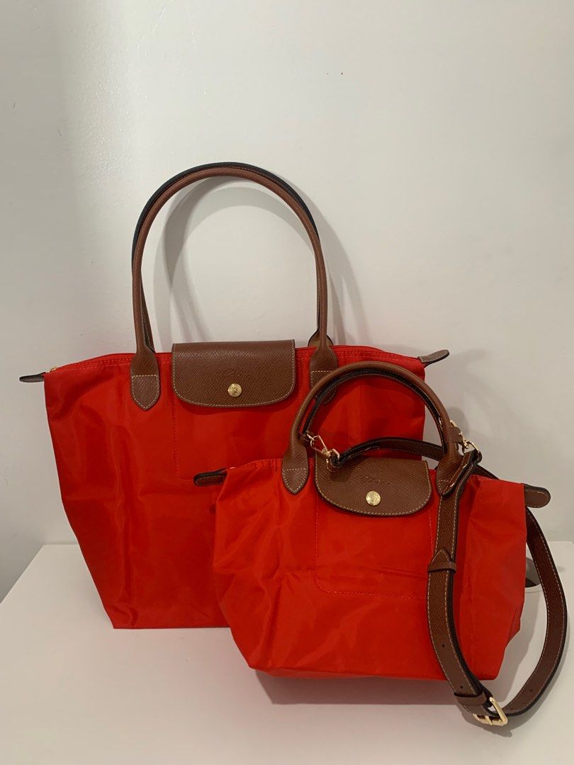 Longchamp Le Pliage in Red (Large) (Category: Luxury Bags & Wallets) located in Manila. Submitted by _girlfinds (Listing ID 1370863187, Image 3). Description: Elevate your daily style with this classic and functional Longchamp tote. 📍 Sourced directly from Japan – self authentication with the provided photos, premium quality. 🎁 Bundles for 2500 - Mix & match combos (subject to availability), ask first: ✔️ 2 Longchamp Bags ✔️ Dust bag or packagi