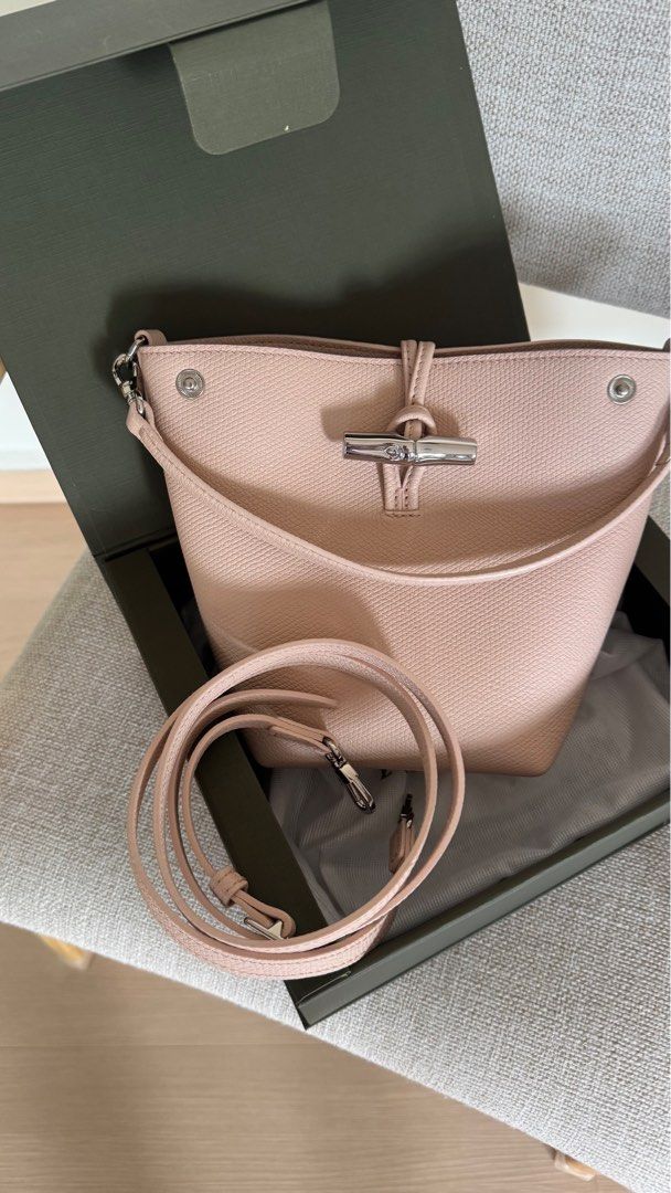 Longchamp LE ROSEAU XS BUCKET BAG Ballerina - Leather (Category: Bags & Wallets) located in Singapore. Submitted by codywoody36 (Listing ID 1370944005, Image 3). Description: Longchamp LE ROSEAU XS BUCKET BAG Ballerina - Leather brand new with box $680 Longchamp LE ROSEAU XS BUCKET BAG Black - Leather + additional strap used once $500 .