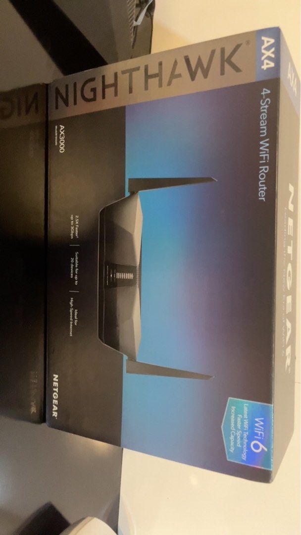 Netgear Nighthawk AX4 AX3000 4-Stream WiFi Router (Category: Networking) located in Singapore. Submitted by rdragon1668 (Listing ID 1370918917, Image 2). Description: Hey there! Selling a brand new Netgear Nighthawk AX4 AX3000 4-Stream WiFi Router. This router is perfect for those looking for high-speed internet and increased capacity. It supports up to 20 devices and is ideal for high-speed internet. It's a great choice for anyone looking to upg