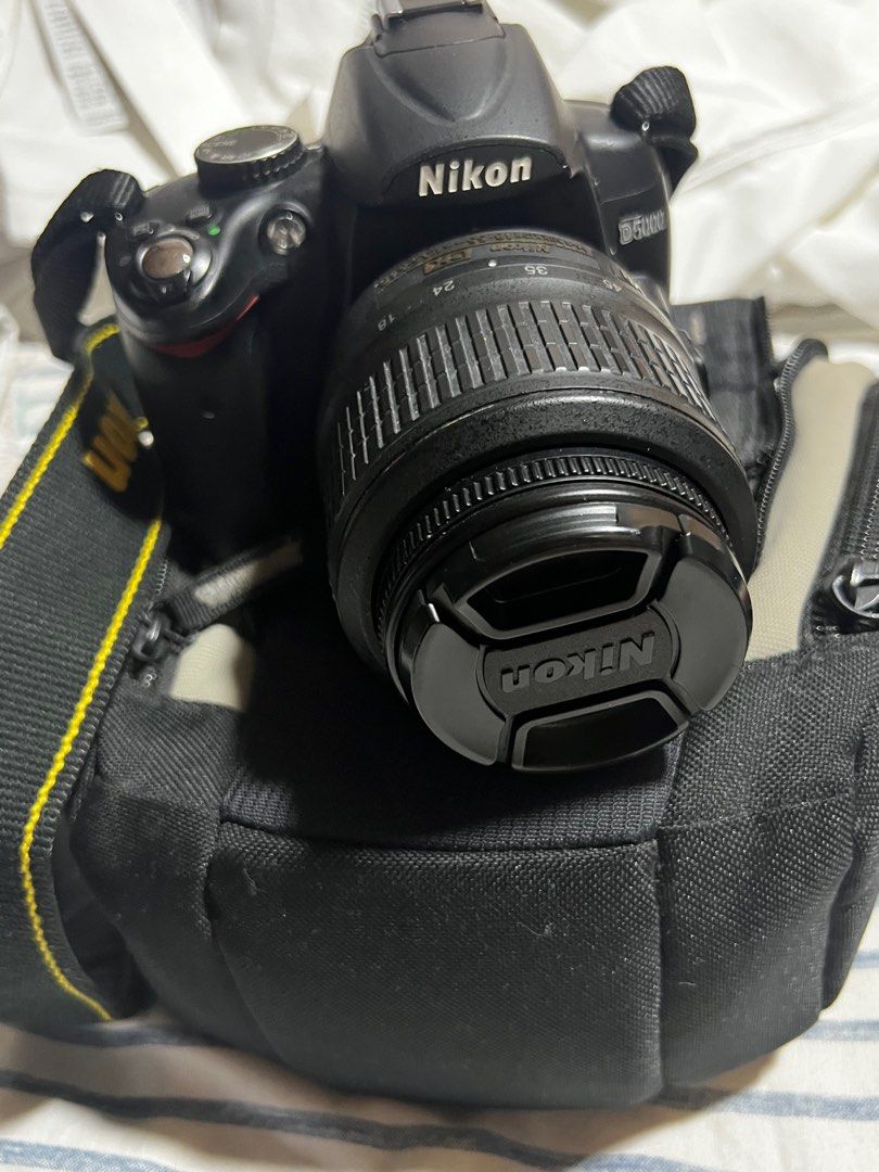 NIKON D5000 DSLR CAMERA (Category: Cameras) located in Cavite. Submitted by maknaelala6 (Listing ID 1370873628, Image 1). Description: Nikon D5000 DSLR Camera 📷 Specs & Inclusions: • Nikon D5000 Body (no issues) • 1 Lens • Charger (wire only not the battery charger) you can buy battery charger in orange app • SD Card • Nikon Strap & Bag.