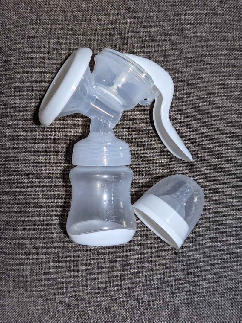 Portable Breast Pump, Hand Pressure Breast Pump (2 sets na!) (Category: Breastfeeding & Bottle Feeding) located in Cavite. Submitted by mommyd.clutter (Listing ID 1370977348, Image 2). Description: ➡️Used only a few times. Mahina nakukuha ko milk thru pumping kaya latch nalanh si Baby sakin, kasi mas malakas ang milk pag latch. ➡️The breast pump comes with a dust cover and comes with a feeding bottle with silicone nipple. ➡️Sold as bundle (2 brea