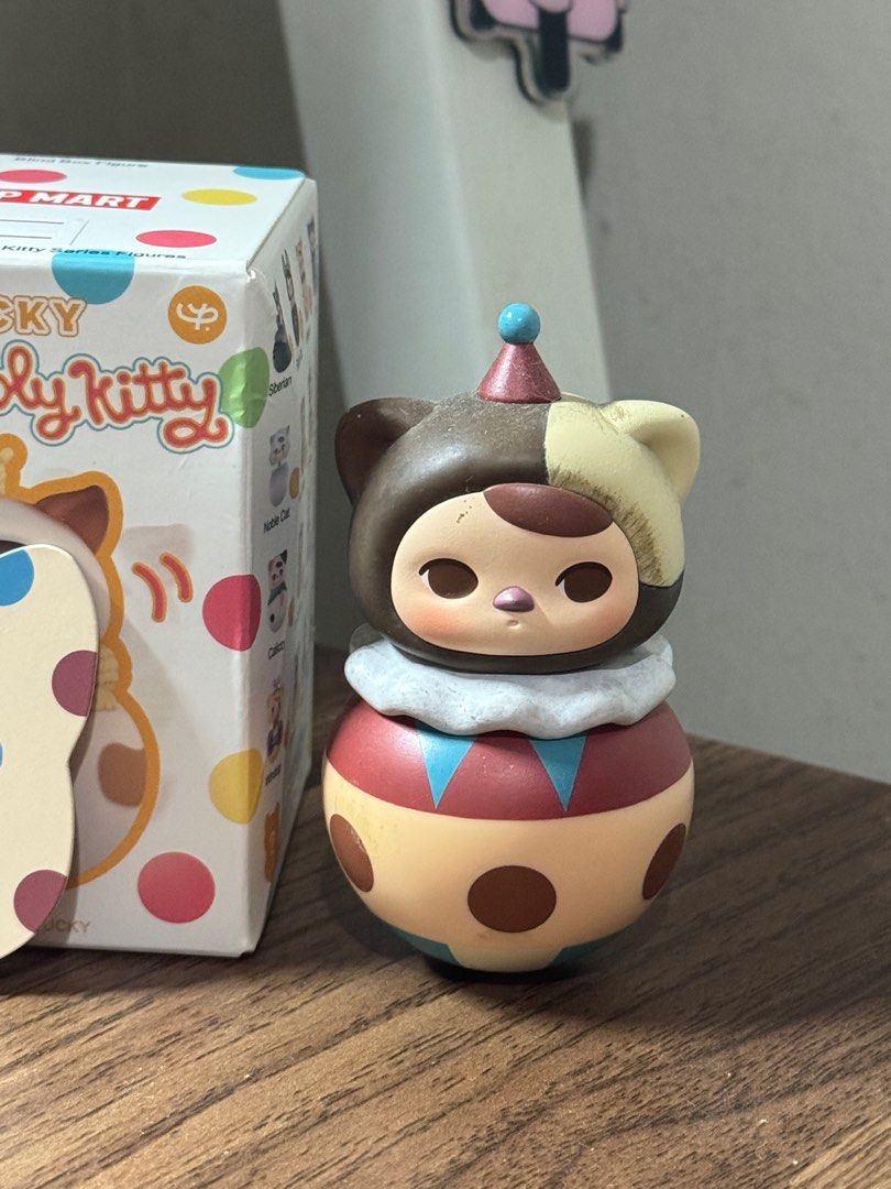 PUCKY Roly Poly Kitty - CIRCUS (Category: Designer & Blind Box Toys) located in Cainta. Submitted by lmsyyyy (Listing ID 1370938630, Image 2). Description: With foil and card Box opened at the bottom Can send more photos RFS: Decluttering.