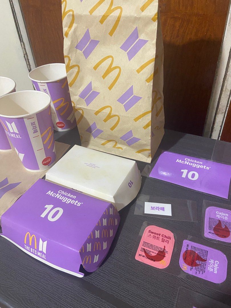 Take all - BTS Meal McDonald's Collection (Category: Character Goods) located in Quezon City. Submitted by addeclutter (Listing ID 1370870178, Image 2). Description: 4pcs paper bag (3 are in prestine condition) 3pcs cups 1pc chicken nuggets box laminated 3pcs Cajun sauce laminated 2pcs Sweet Chili Sauce laminated Dismantled chicken nuggets box with parts laminated.
