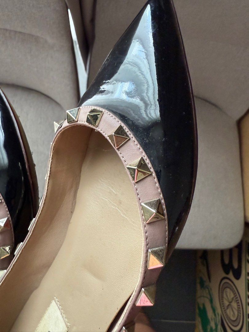 Valentino Garavani Rockstud Flats (Category: Sneakers & Footwear) located in Cebu City. Submitted by halcyone728 (Listing ID 1370878530, Image 3). Description: Condition: Gently used with creasing and minor scuffing Inclusions: None Size: EU36.5 Material: Patent leather upper, leather sole Color: Black .