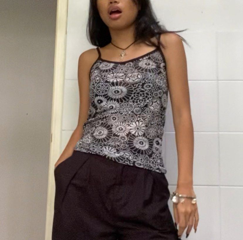 y2k black & white floral spaghetti top (Category: Sleeveless) located in Marikina City. Submitted by vicwolfie (Listing ID 1370866178, Image 3). Description: 🐼 condition: 8/10 🐼 stretchy, see through 🐼 dm for more pics.