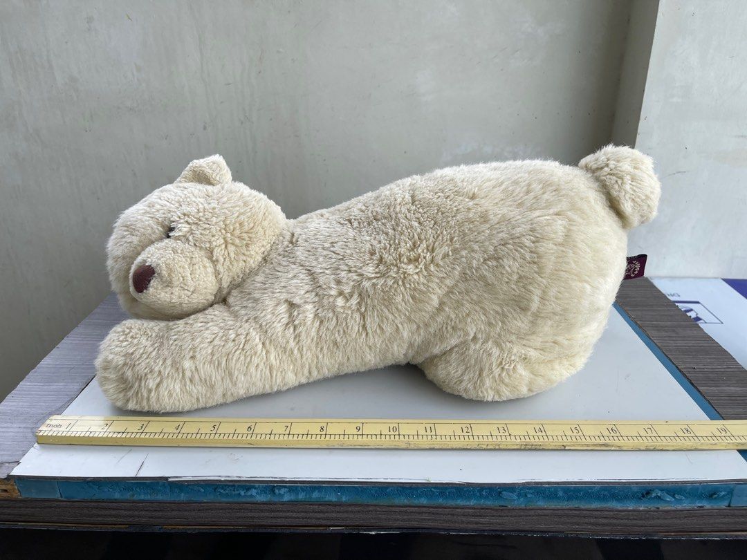 18-inch Bear Cuddler Teddy Bear (Category: Plushies & Soft Toys) located in Silang. Submitted by homeboyenterprise (Listing ID 1371105074, Image 1). Description: This is a teddy bear is from Bear Cuddler brand. It features a teddy bear in a napping/relaxing position. They are cleaned before stored in a closet for some time. These were my sister’s toys, so they are well used. 200 + shipping via JNT (sf is more or less 150).