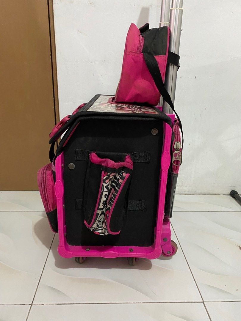 Barbie Trolley Bag (Category: Strollers) located in Quezon City. Submitted by ziaianana (Listing ID 1371130144, Image 3). Description: Can Negotiate on price Details: 7k+ og price Only used for one school year Complete accessories Bag cover needs a wash & has a name May patungan ng paa & can sit on it Very spacious ang loob Dm me for more details.