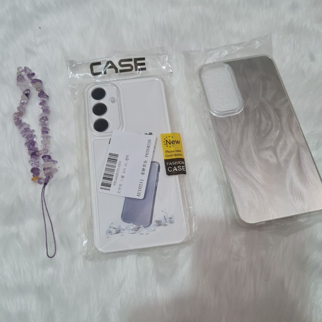 Brandnew Samsung A35 5G case set with accessory (Category: Cases & Sleeves) located in Cavite. Submitted by iammil (Listing ID 1371032641, Image 1). Description: Brand new /Never been used Samsung A35 5G cases with free keychain/ phone accessory. As is with the pictures. RFS: bought wrong variant, should be for A53 5G 😅.