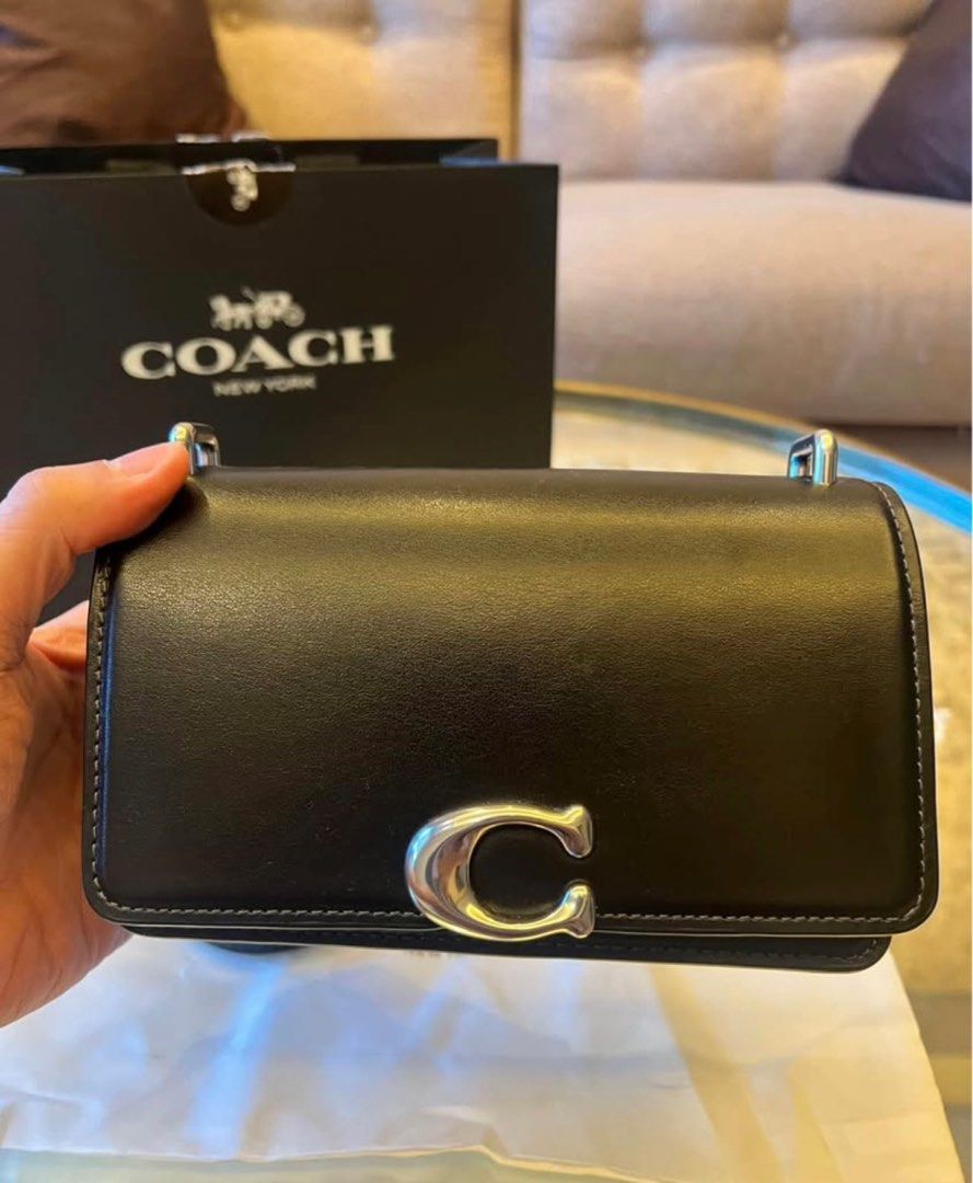 Coach Bandit Crossbody Bag (Category: Luxury Bags & Wallets) located in Pasig City. Submitted by jm_munar (Listing ID 1371029613, Image 3). Description: Original SRP 34,500 - Bought from Rustan’s Shang - can send more detailed videos. Comes complete L 18cm x H 11cm x W 6.5cm Adjustable strap with 54.5cm drop for shoulder or crossbody wear Material: Luxe refined calf leather Don’t let its name fool you: the put-together Coach Bandit Crossbody Bag 