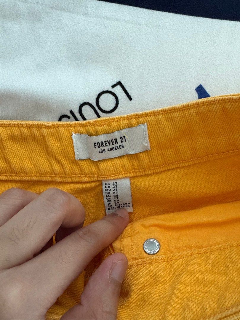 Forever 21 Yellow shorts (Category: Shorts) located in Quezon City. Submitted by coffeeandcodals (Listing ID 1371029991, Image 3). Description: 1. Fits 27-28 inches hw 2. Nice color pa 3. No issues 4. Material is denim.