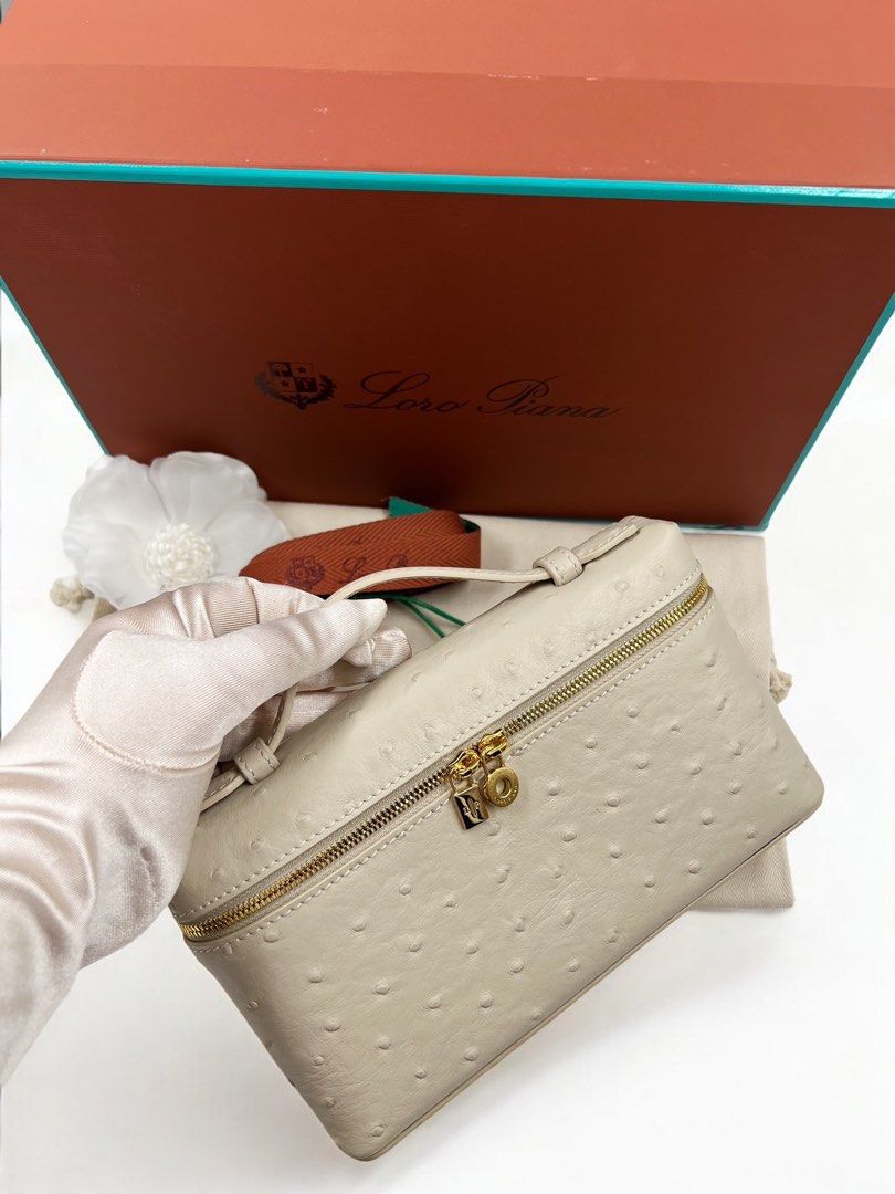 ⚜️Loro Piana - L19 bag (Category: Luxury Bags & Wallets) located in Makati City. Submitted by 90sangel (Listing ID 1371107582, Image 2). Description: •Item: L19 - The iconic Extra Pocket, — can be carried by hand or crossbody. Crafted from luxury ostrich leather ⚜️🤍in beige color 🥯🍦🍨 •Size: 11 x 19 x 6.5 cm •Condition: Gently Used, Good as New! *Negotiable (: RARE and hard to get! .