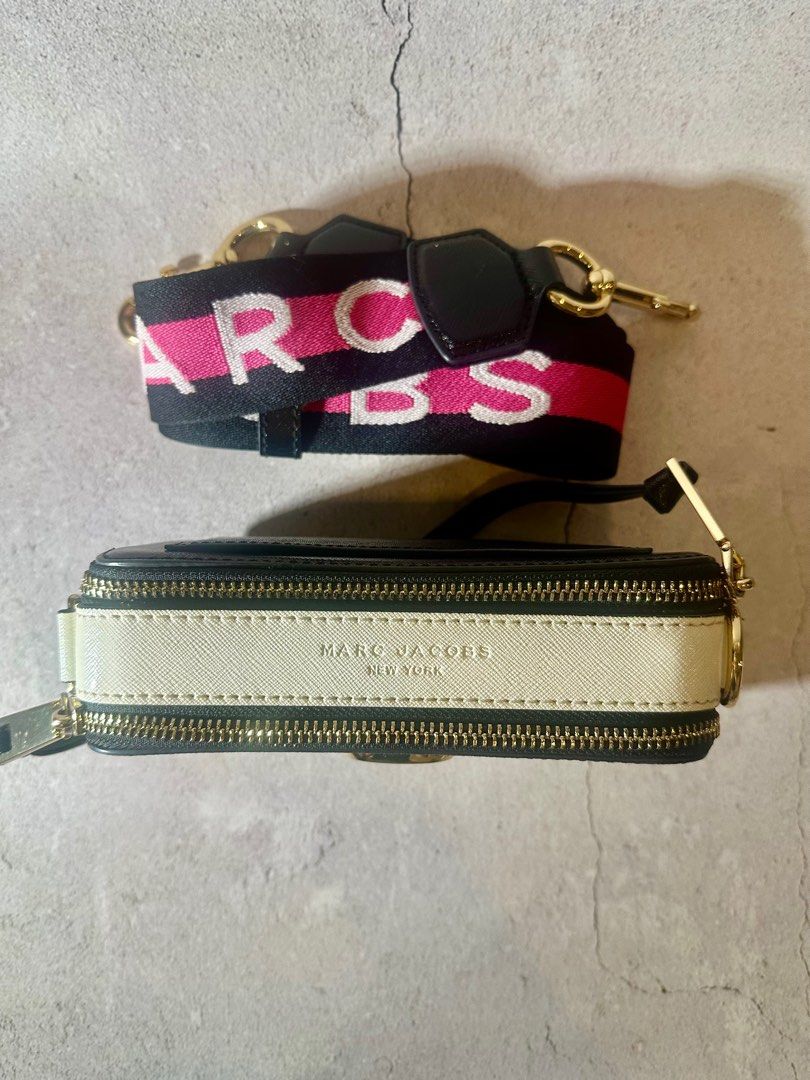 Marc Jacobs Snapshot Camera Bag (Category: Luxury Bags & Wallets) located in Pasay City. Submitted by jacknjiill (Listing ID 1371130583, Image 3). Description: Authentic Marc Jacobs With adjustable strap Gold hardware No dustbag Issues: minimal leather crack, faded in metal sling holder ( see photos) Rfs: decluttering .