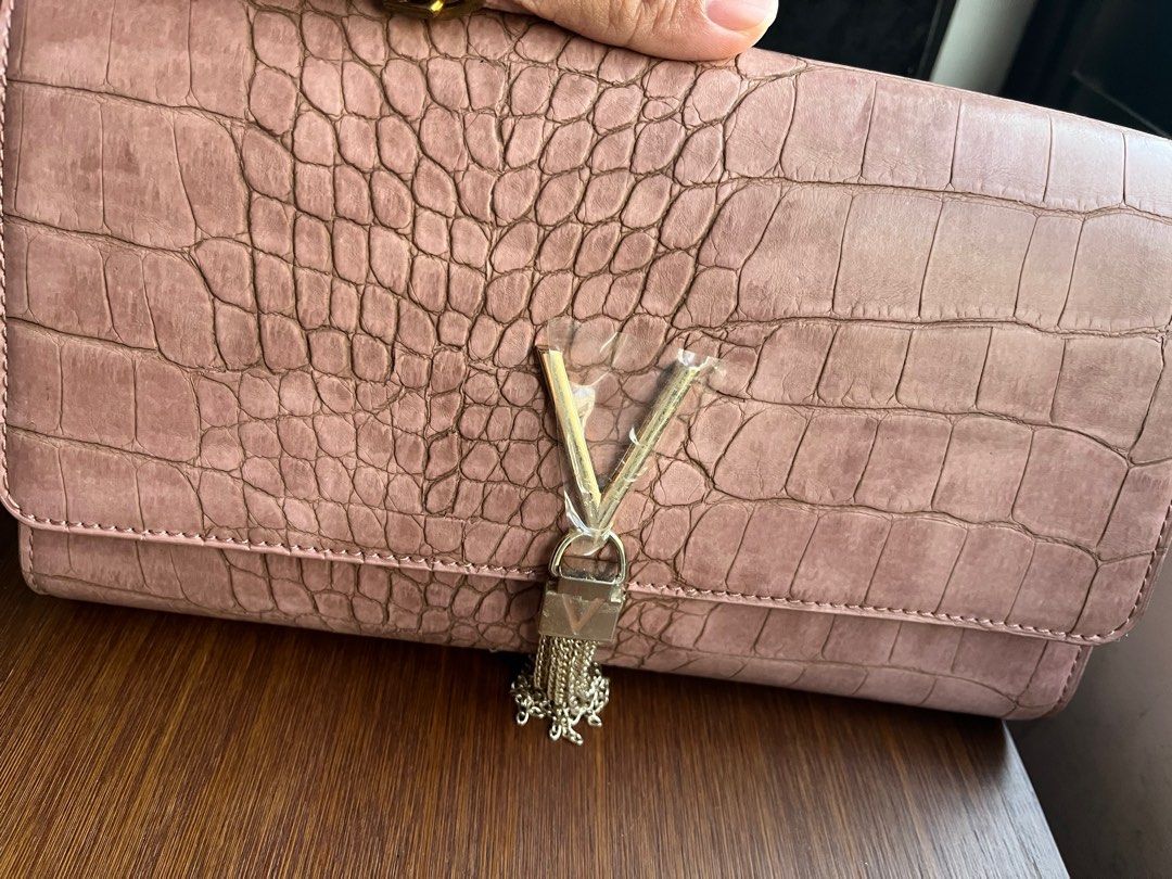 Mario Valentino audrey clutch bag (Category: Clutches) located in Calamba. Submitted by rosychix (Listing ID 1371096798, Image 1). Description: Pre-loved item Color: old rose Crocs leather has fadings on the sling .