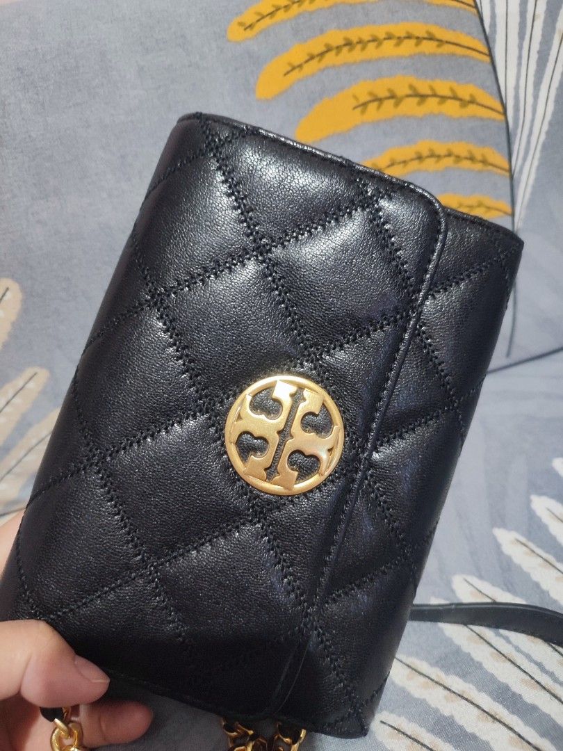 Original Tory Burch sling/clutch bag (Category: Luxury Bags & Wallets) located in Manila. Submitted by tetel (Listing ID 1371164190, Image 2). Description: Slightly negotiable. Used twice only for a wedding event. No scratch, like new pa po. Bought it sa online seller based in US while doing live sa store ng tory burch kaya guaranteed legit item po..