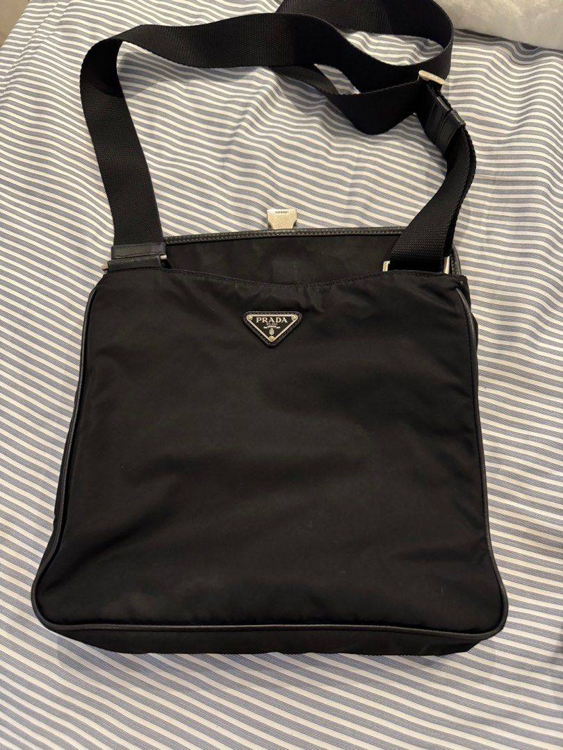 Prada sling bag (Category: Luxury Bags & Wallets) located in Makati City. Submitted by marckyboy (Listing ID 1371138925, Image 2). Description: Authentic prada bag.
