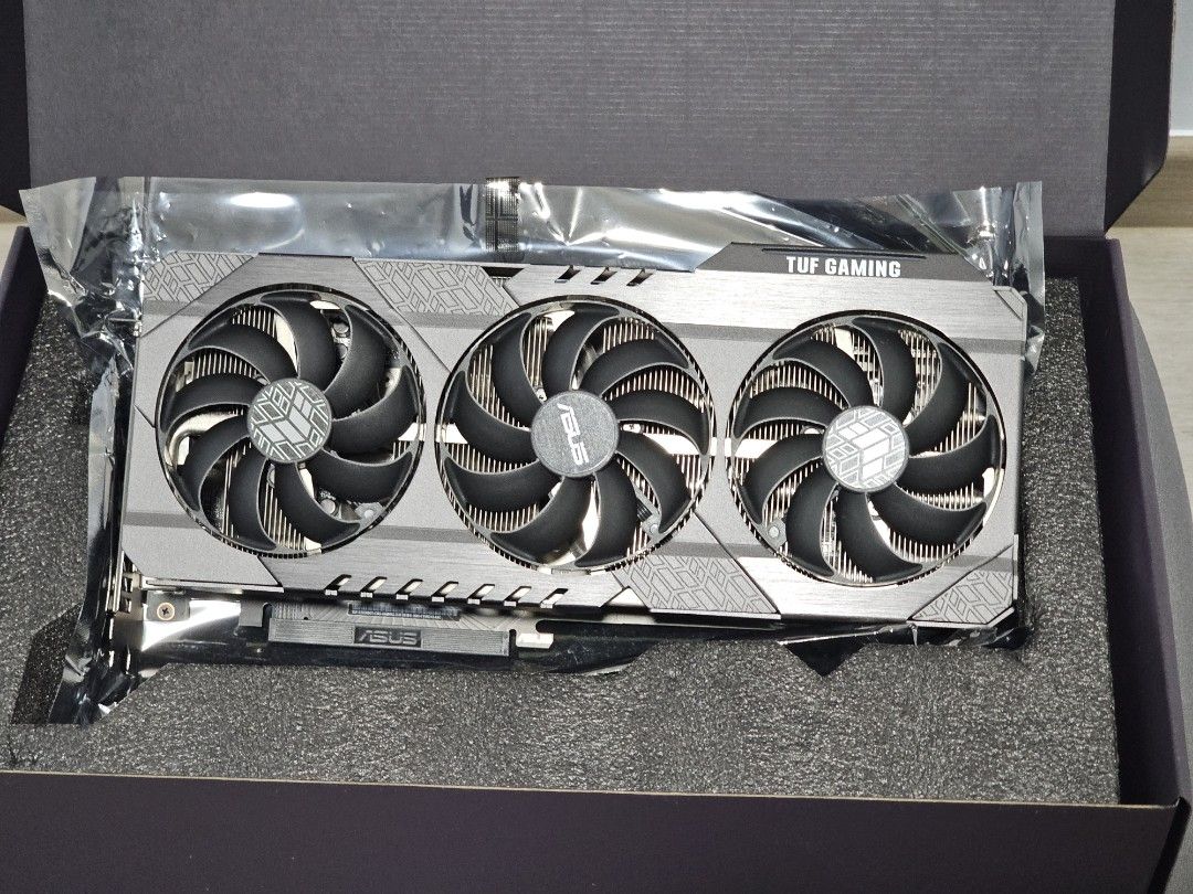 RTX 3060ti Asus Tuf (Category: Computer Parts) located in Singapore. Submitted by shop.angela (Listing ID 1371154745, Image 2). Description: Asus Tuf 3060ti v2 LHR, lightly used on weekends gaming. In good condition with original box and anti-static bag. Able to output 100 fps+ on RDR2 in ultrawide 2k gaming. Selling only because I bought a new GPU. Meet up at City Hall / Clarke Quay /Tampines / Woodleigh mrt only. Will not entertain low ballers.