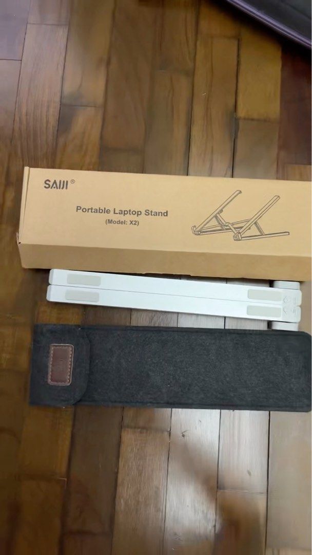 SAIJI Portable Laptop Stand (Model: X2) (Category: Laptop Bags & Sleeves) located in Singapore. Submitted by nuetook (Listing ID 1371079308, Image 1). Description: .