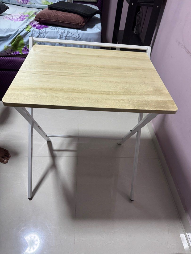 Study Table (Foldable) (Category: Tables & Sets) located in Singapore. Submitted by flash95 (Listing ID 1371085774, Image 1). Description: Folding study table. Please note the table is just slightly shaky. Dimensions is 50x60cm. Height is 70cm. Self collect.