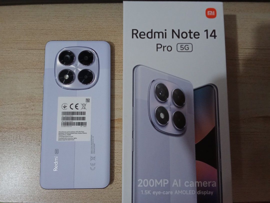 XIAOMI REDMI NOTE 14 PRO 5G (Category: Xiaomi) located in Manila. Submitted by 1faqshop (Listing ID 1371140507, Image 1). Description: XIAOMI REDMI NOTE 14 PRO 5G COLOR: PURPLE LEATHER WITH BOX AND CHARGER SET MINT CONDITION ISSUE: SLIGHT FADED ON METAL FRAME.