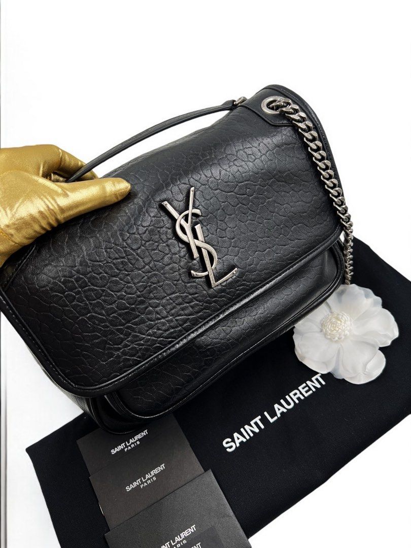 ⚜️YSL Niki bag (Category: Luxury Bags & Wallets) located in Makati City. Submitted by 90sangel (Listing ID 1371102405, Image 2). Description: •Item: YSL (Saint Laurent) Niki bag 🖤💼✨ silver hardware •Size: Medium •Condition: Gently Used, Good as New! *This includes original dustbag, cards. If you prefer other colors, please let us now. 💼⚜️ (box not included) .