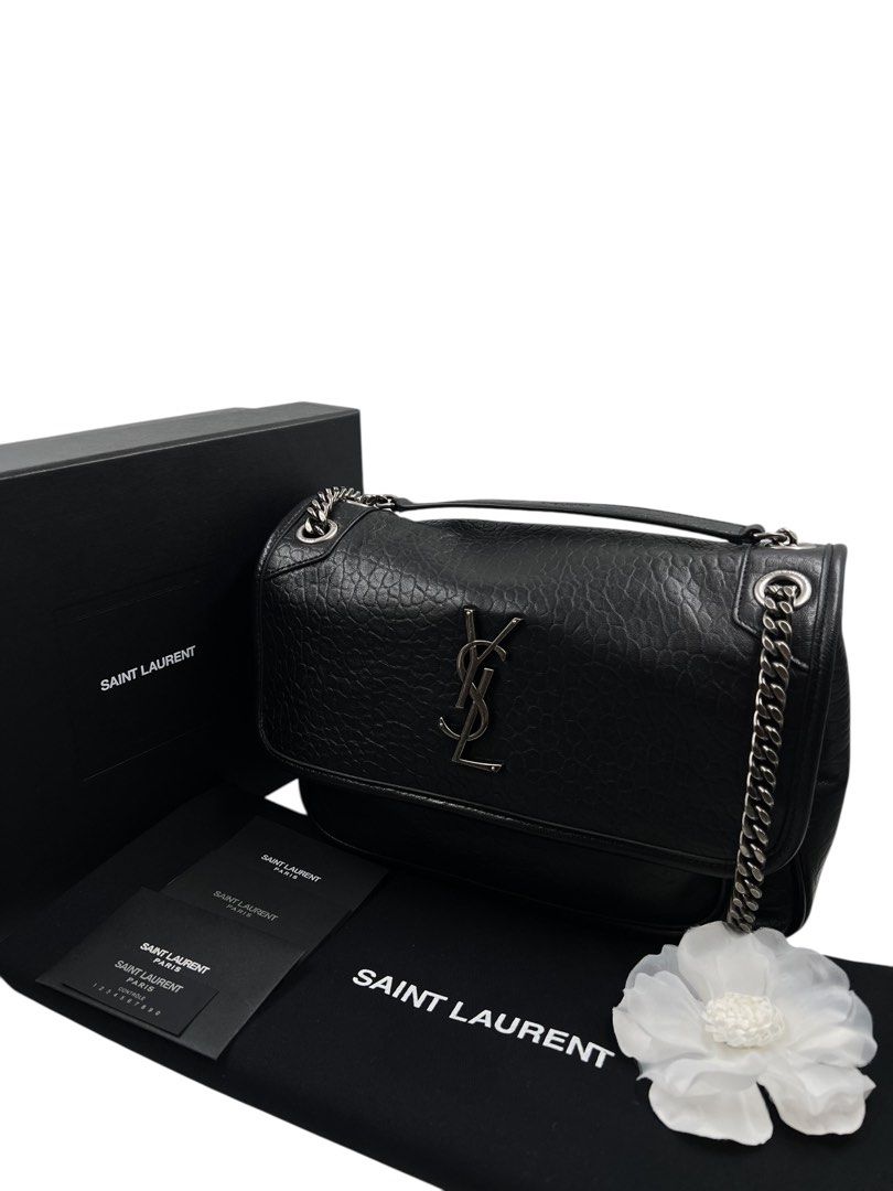 ⚜️YSL Niki bag (Category: Luxury Bags & Wallets) located in Makati City. Submitted by 90sangel (Listing ID 1371102405, Image 3). Description: •Item: YSL (Saint Laurent) Niki bag 🖤💼✨ silver hardware •Size: Medium •Condition: Gently Used, Good as New! *This includes original dustbag, cards. If you prefer other colors, please let us now. 💼⚜️ (box not included) .