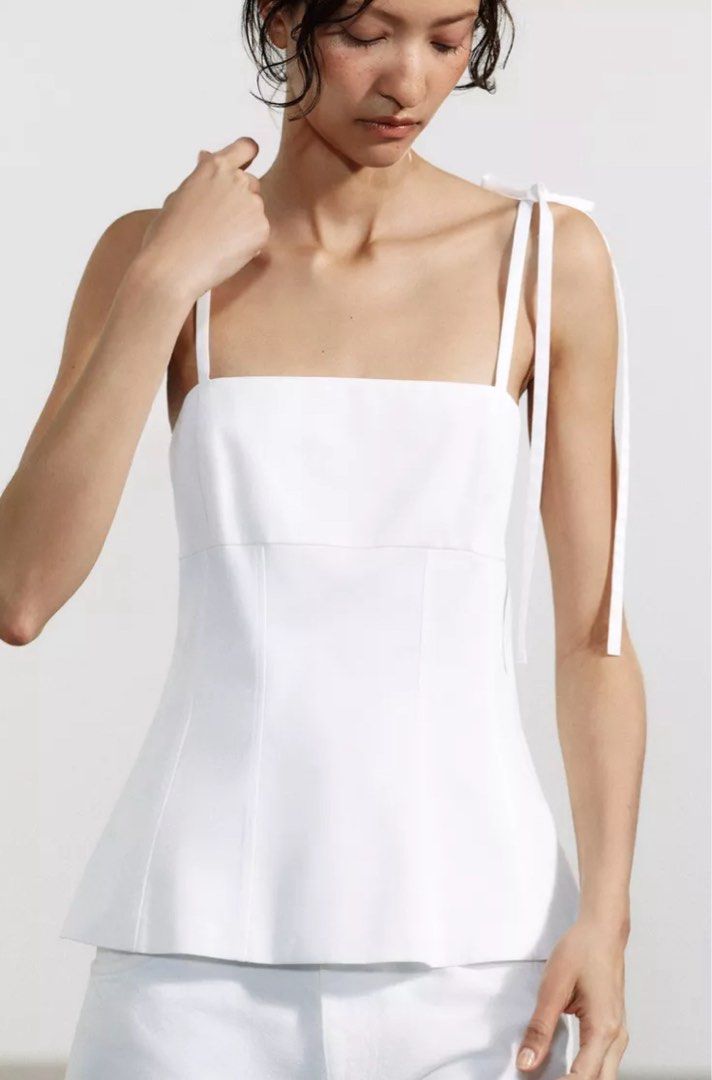 zara fitted top with bows (xs) (Category: Blouses) located in Quezon City. Submitted by eunnaaa (Listing ID 1371050975, Image 3). Description: bought in zara megamall - brand new never been worn - still has the tag - fits size xs mop : gcash .