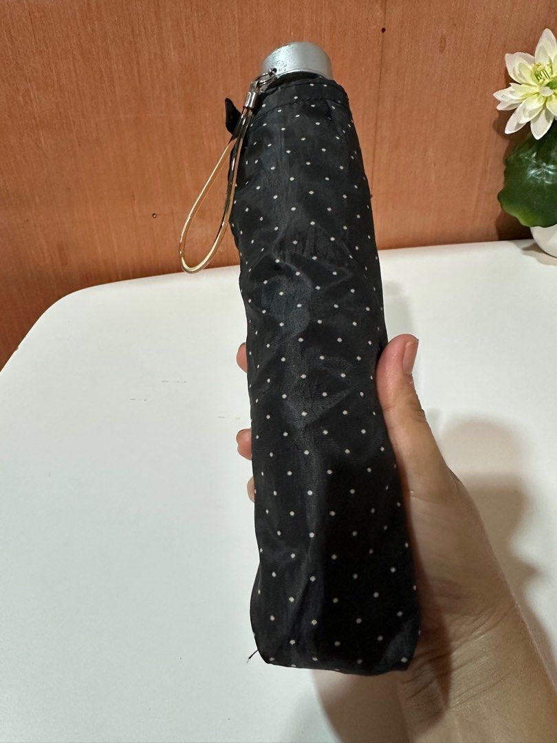 Black Polkadot folded umbrella (Category: Umbrellas) located in Davao. Submitted by favoritepreloved (Listing ID 1371289659, Image 1). Description: ❤️ very lightweight ❤️ handle made of aluminum material ❤️ japan surplus source ❤️ 24cm length when folded.