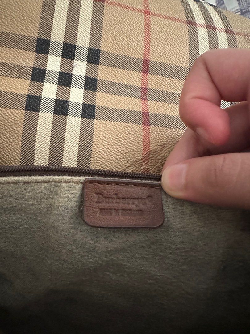 Burberry’s (Category: Luxury Bags & Wallets) located in Ilagan. Submitted by whiskyandeevie (Listing ID 1371252178, Image 3). Description: Burberry’s Haymarket Check Crossbody Bag (Vintage) Rank AB Okay on the inside but with issue on the straps (slight fading) and tarnish on metal. Pero still good to use. Leather is on point 😍 Selling it very low. Original!! .