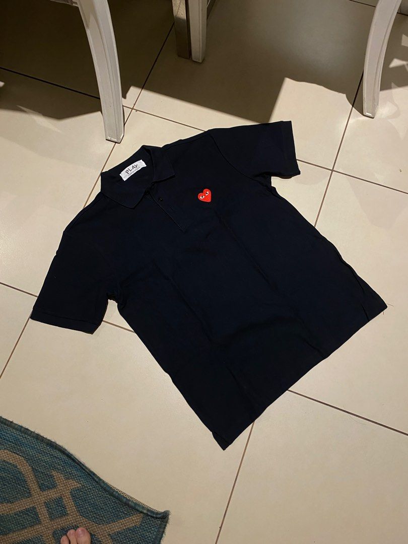 1k? CDG Play Polo shirt (Category: Tshirts & Polo Shirts ) located in Quezon City. Submitted by Always_Disposing (Listing ID 1371326786, Image 1). Description: Brand New Condition Thrifted these, but gained weight so it does not fit me now 10/10 missing side tag Amazing fit! 22 x 28 (L-XL.
