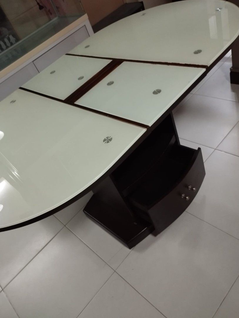 Dining Table (Category: Tables & Sets) located in Singapore. Submitted by jacktherippersss (Listing ID 1371332315, Image 3). Description: Expendable glass table $120 L115cm W 84cm H64cm unextended L145cm W84cm H74cm extended Foc 3 chairs self collect or delivery at $80.