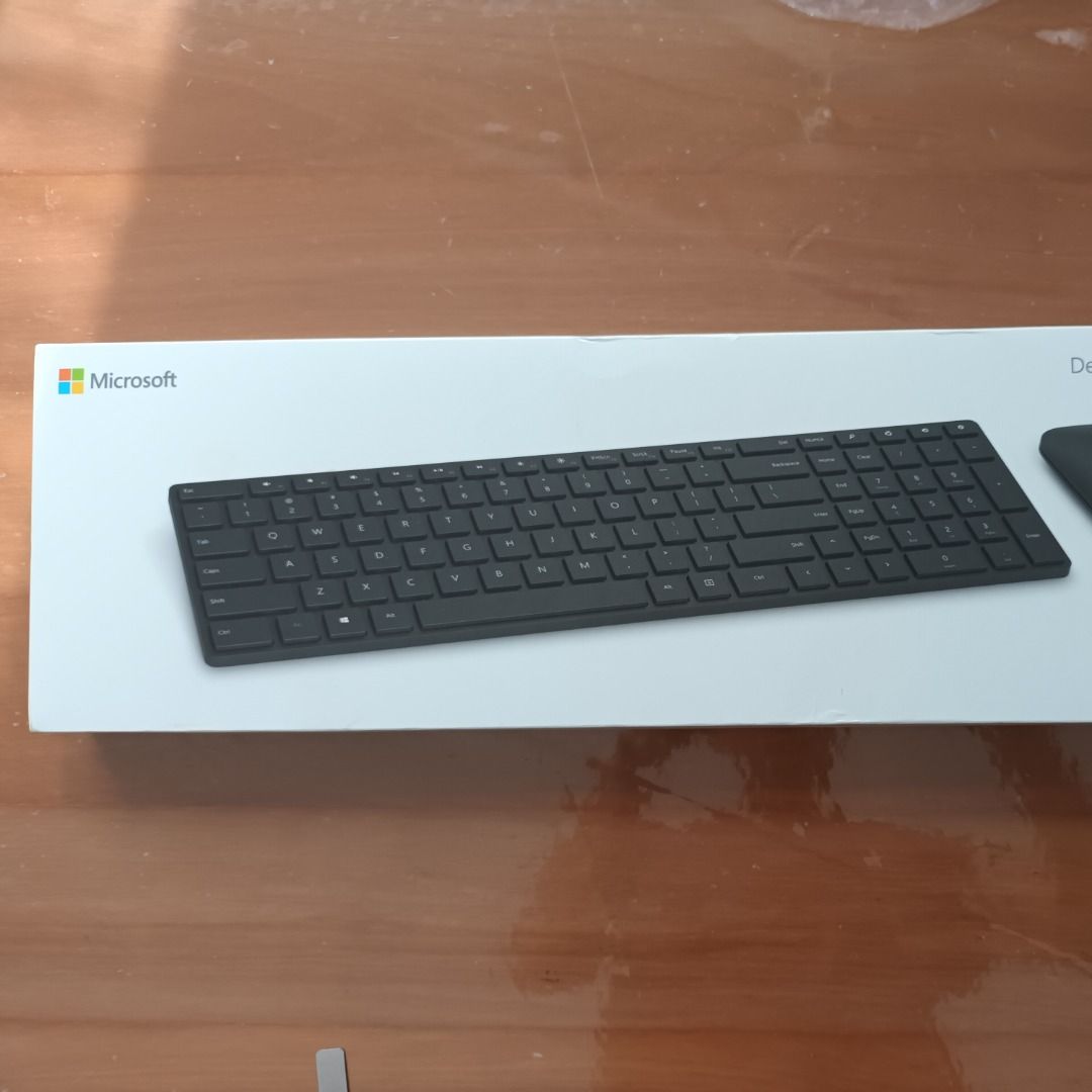 Computer & Tech (Category: Computer Keyboard) located in Singapore. Submitted by keyscale168 (Listing ID 1371255694, Image 3). Description: Microsoft Designer Bluetooth Keyboard and mouse PC compatible Built in number pad, ultra thin and modern. Model Number 1678, 1679 An enhanced keyboard comes with 12 function keys row on top of the keyboard. Every mechanical, ergonomic,wireless, design and gaming keyboard is based on enhanced keyboard style. k