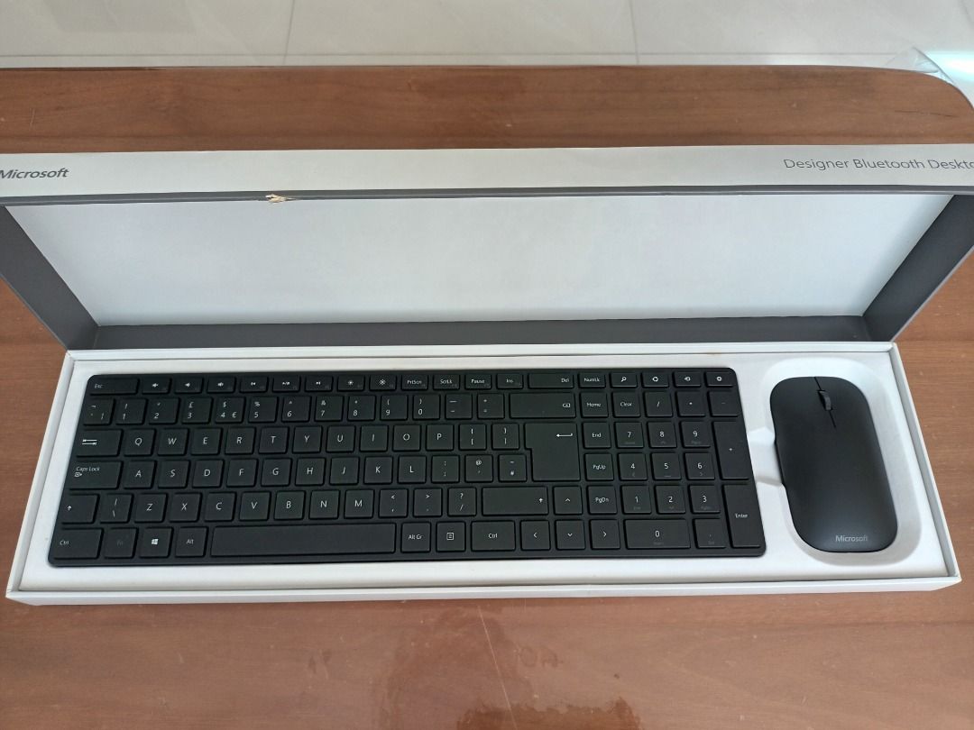 Computer & Tech (Category: Computer Keyboard) located in Singapore. Submitted by keyscale168 (Listing ID 1371255694, Image 1). Description: Microsoft Designer Bluetooth Keyboard and mouse PC compatible Built in number pad, ultra thin and modern. Model Number 1678, 1679 An enhanced keyboard comes with 12 function keys row on top of the keyboard. Every mechanical, ergonomic,wireless, design and gaming keyboard is based on enhanced keyboard style. k