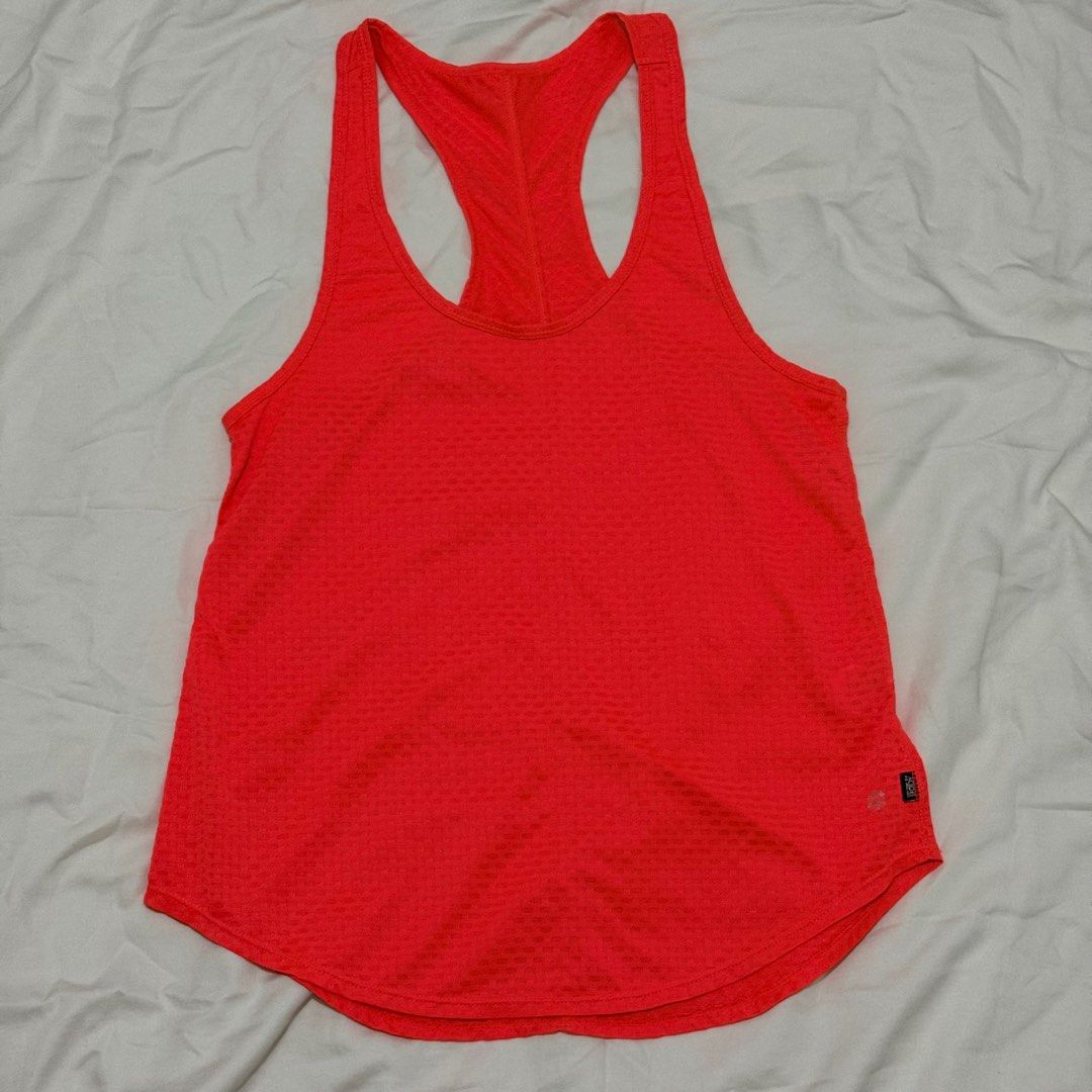COTTON ON NEON RED TANK TOP (Category: Activewear) located in Quezon City. Submitted by hell0.leila (Listing ID 1371334318, Image 1). Description: 🖤 no flaws apart from faded logo due to washing 🖤 thick material 🖤 rfs: decluttering 🖤 size: M (but fits up to L) Flat lay dimensions: L: 27.5in (long back) W: 17in ❗️No lowballers please ❗️MOP: GCash or BDO only ❗️Delivery fee c/o buyer ❗️No rush shipping.