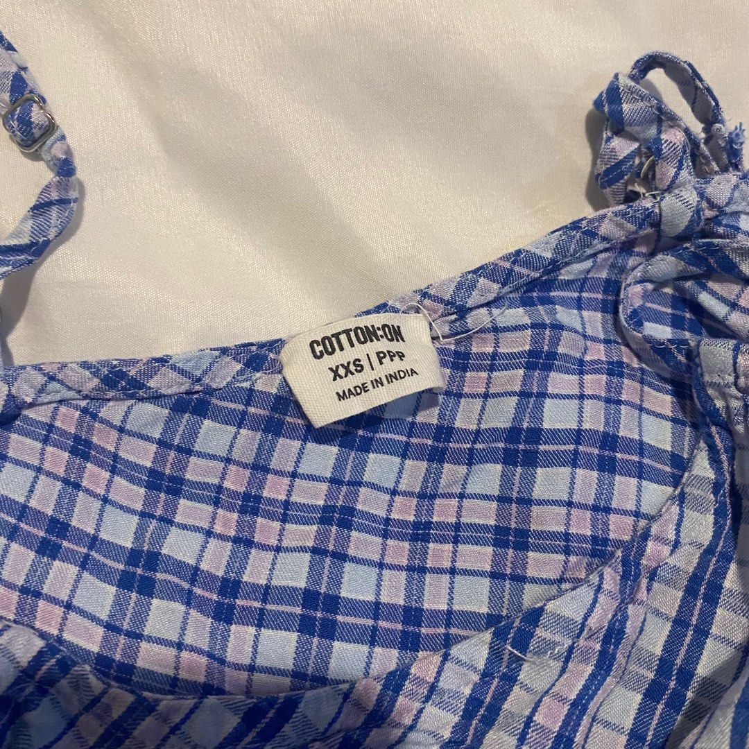 COTTON ON plaid blue mini sundress (Category: Dresses) located in Quezon City. Submitted by ilybianca (Listing ID 1371323853, Image 2). Description: comes with strings to cinch your waist hehe super cute dress perfect to wear in this summer weather !!!! size: XXS on tag length: ~24in dm me i’ll accommodate requests for additional measurements and photos :)) gcash + jnt , lalamove.
