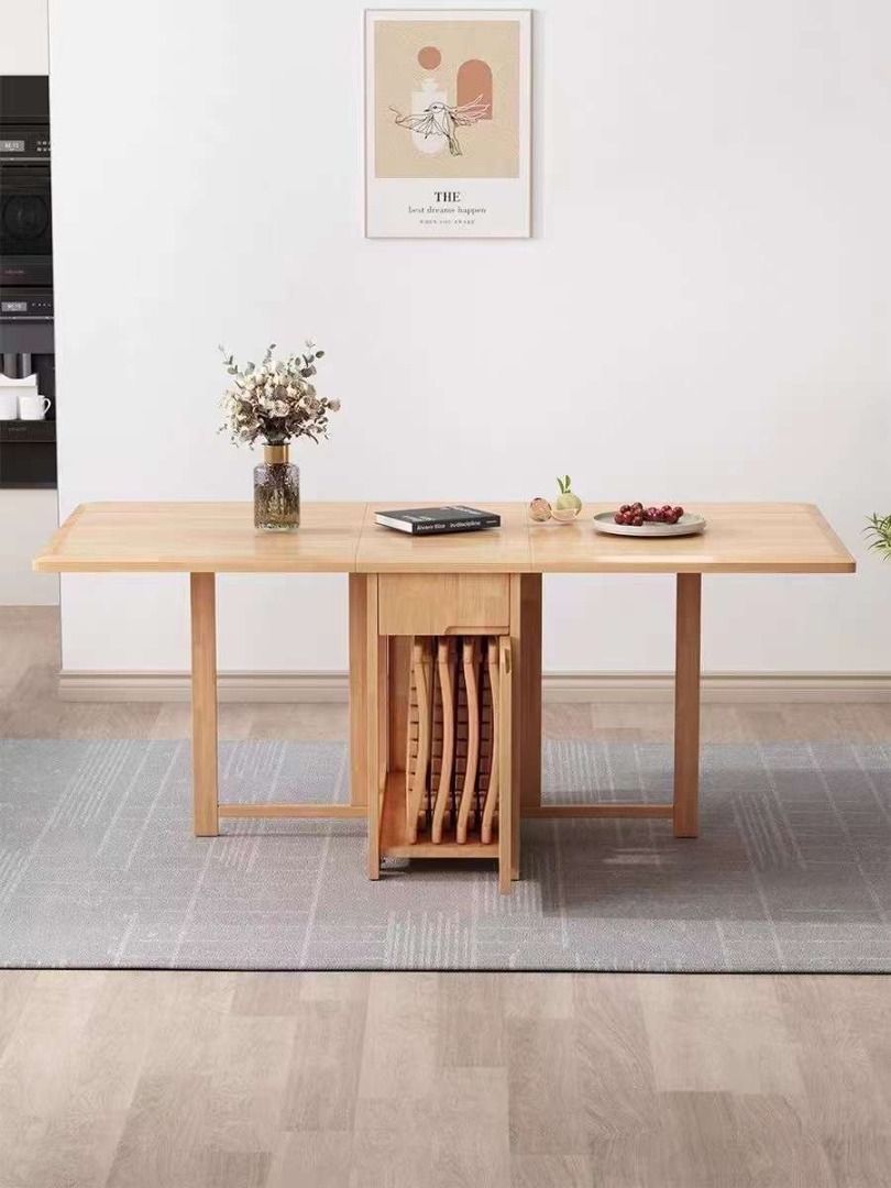 Diing Tables [TB547] (Category: Tables & Sets) located in Quezon City. Submitted by johnericna90745 (Listing ID 1371261130, Image 2). Description: Space saver foldable dining table, can be console table at the same time dining table once extended. Good for small spaces specially for condos and small room. Includes of compartment for the chairs to save space and has a wheels to easily move. Made of Solid wood materials, can use long time. Size/s: 