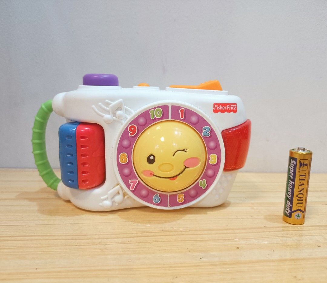 Fisher-Price Laugh & Learning Camera Toy (Category: Educational & Learning Toys) located in Quezon City. Submitted by babylianne (Listing ID 1371354897, Image 1). Description: Fisher-Price Laugh & Learning Camera Learning camera entertains baby with fun sounds and lights Hear phrases by batting at the smiley face Hear fun camera sounds when pressing the toggle Take pictures to hear fun sounds and songs Take the Learning Camera everywhere with the