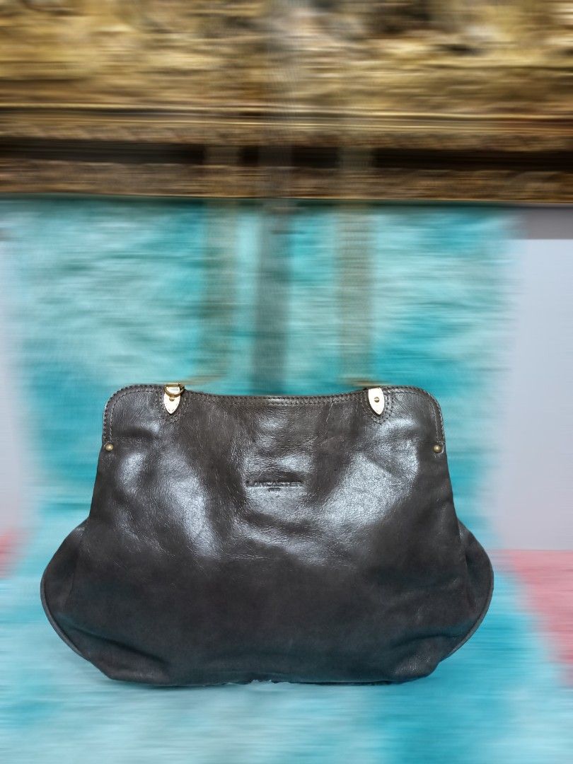 Lancaster Kisslock Vintage Authentic (Category: Luxury Bags & Wallets) located in Santo Tomas. Submitted by mybellacloset158 (Listing ID 1371213501, Image 2). Description: Authentic Lancaster Vintage Kisslock In good condition made in Cowhide Leather No flaws just minimal sign of wear. Medium size, Light weight. Has long chain and leather strap. Napaka Suayal na Vintage bag. Very sophisticated..