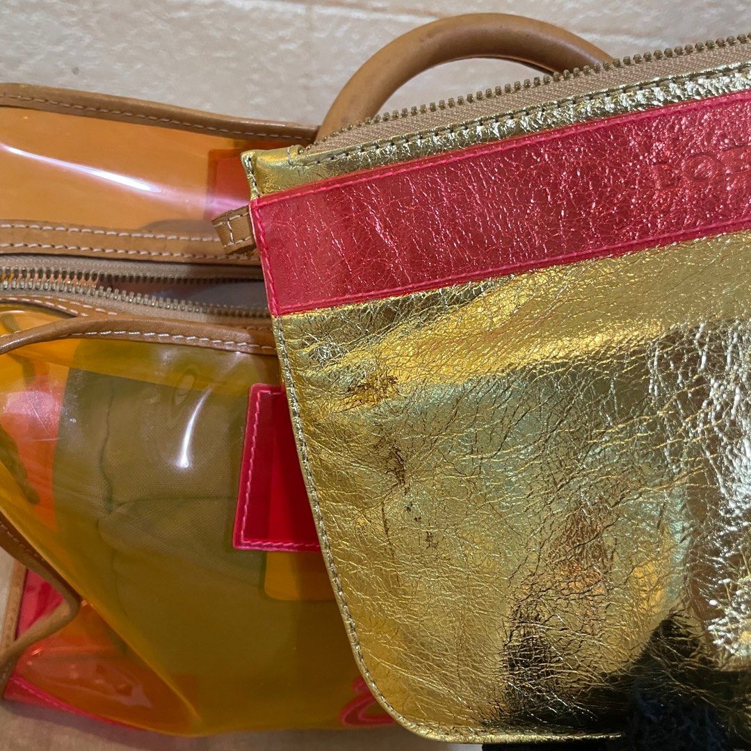 LOEWE Transparent Amazon Limited Edition (Category: Luxury Bags & Wallets) located in Pasig City. Submitted by reallifeofashowgirl (Listing ID 1371210908, Image 3). Description: - Limited edition from LOEWE, comes with its pouch with unnoticeable stain (see photo) - Some signs of use but unnoticeable when worn, very minor - Perfect for the summer/any trip - Unique bag - DM to haggle.