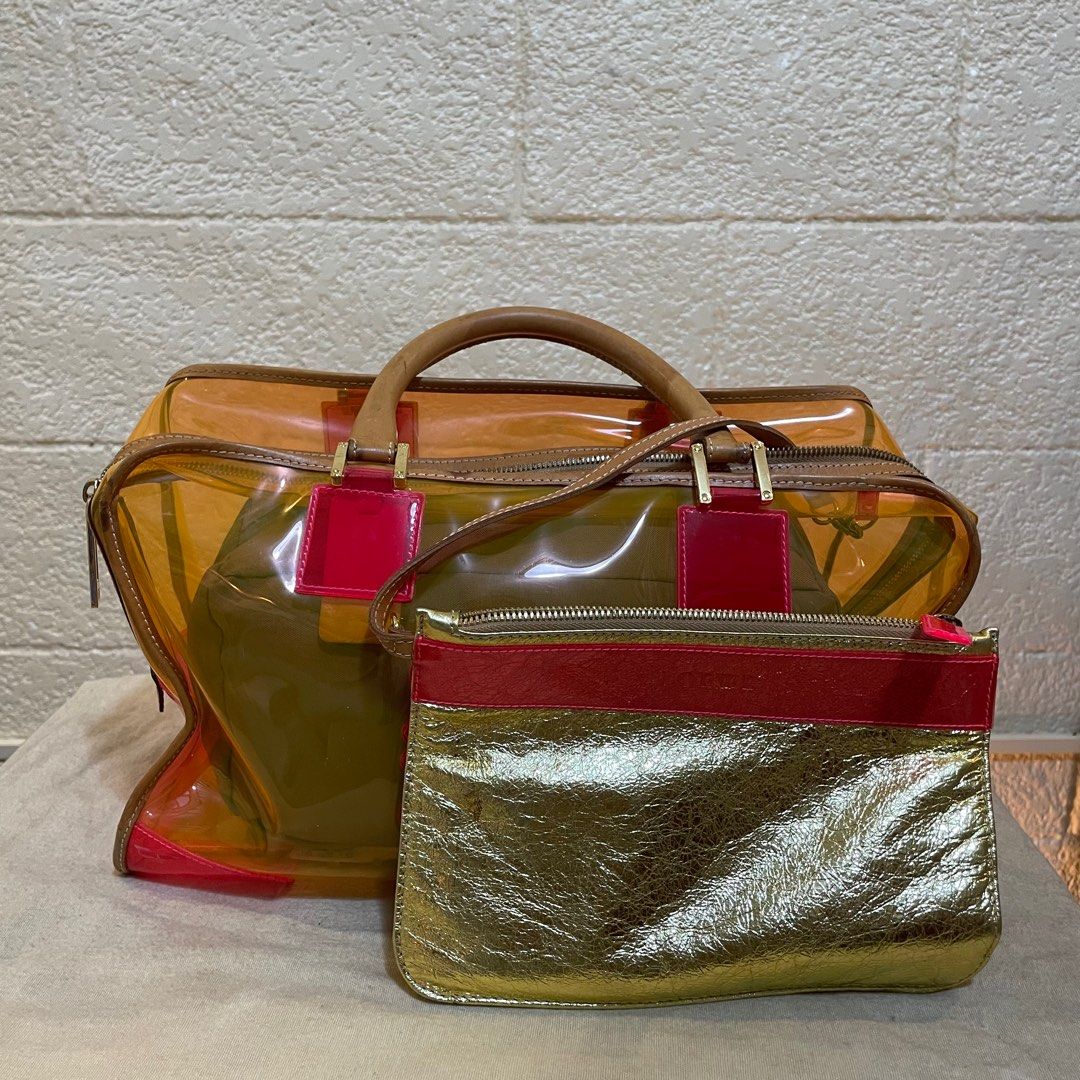 LOEWE Transparent Amazon Limited Edition (Category: Luxury Bags & Wallets) located in Pasig City. Submitted by reallifeofashowgirl (Listing ID 1371210908, Image 2). Description: - Limited edition from LOEWE, comes with its pouch with unnoticeable stain (see photo) - Some signs of use but unnoticeable when worn, very minor - Perfect for the summer/any trip - Unique bag - DM to haggle.