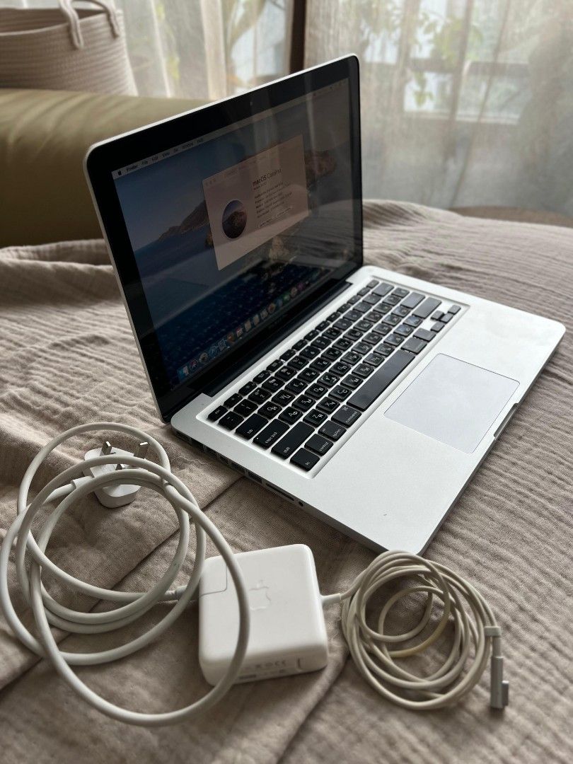 MacBook Pro 13 (Category: Laptops & Notebooks) located in Singapore. Submitted by mikhail_panch (Listing ID 1371227005, Image 1). Description: Title: MacBook Pro 13” i7 • 8GB • 750GB HDD — Great Condition Description: Selling my well-maintained MacBook Pro 13” with upgraded specs and excellent cosmetic condition. Specifications: • Intel Core i7 2.9 GHz • 8GB DDR3 RAM • 750GB HDD • macOS Catalina — freshly installed • 13.3” non-Retina Display (128