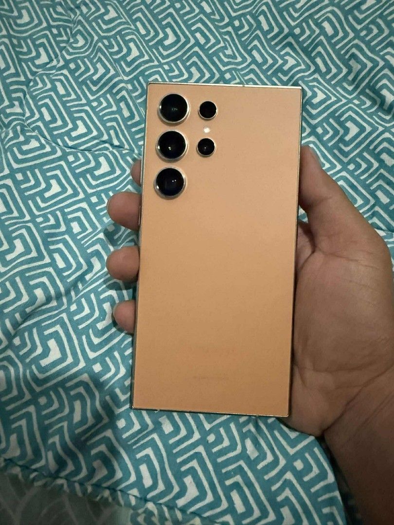 Samsung s24 ultra 512gb (Category: Samsung) located in Taguig. Submitted by edel029 (Listing ID 1371174987, Image 2). Description: Samsung galaxy s24 ultra 512gb Titanium Orange (exclusive color) Openline Ntc approved No issue Unit, case, and cord only Selling price: 39,999 For sale or swap Test and check all you want upon meet up taguig or nearby.