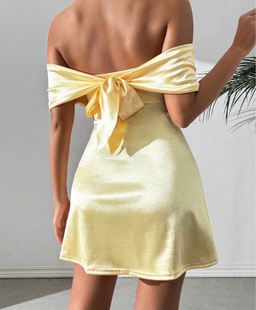 Yellow Silk Mini Dress Off shoulder (Category: Dresses) located in Manila. Submitted by shaee__ (Listing ID 1371308261, Image 2). Description: • stretchable • small to medium • last price posted.
