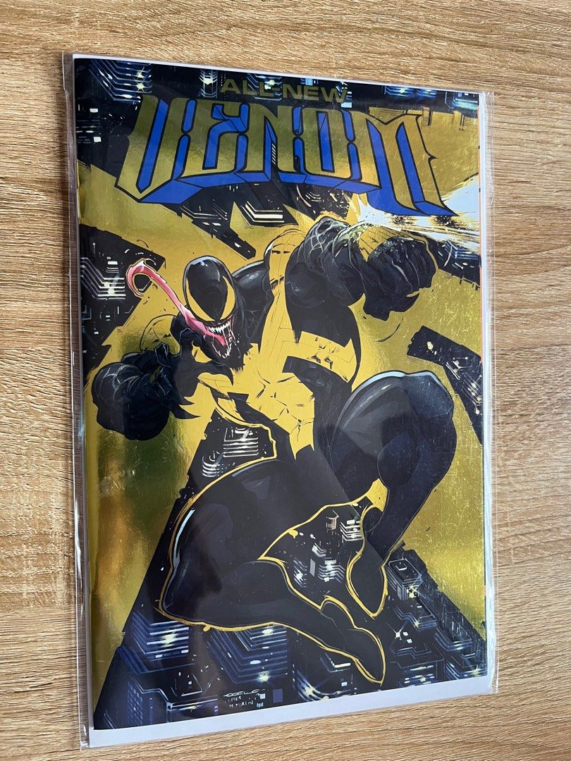 All new Venom Gold foil variant (Category: Comics & Manga) located in Quezon City. Submitted by jhonquel (Listing ID 1371409664, Image 1). Description: All new Venom Gold foil variant Bagged and boarded. QC area. NCR prefer transactions. .