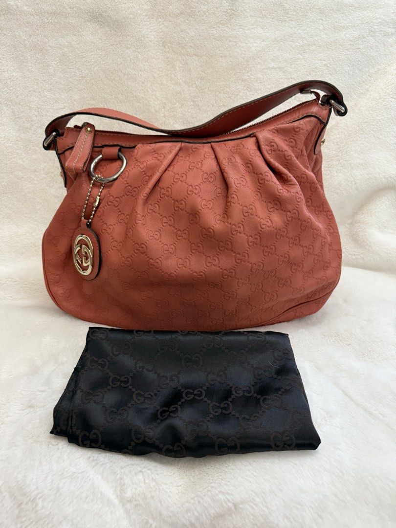 Authentic Gucci Guccissima Sukey Monogram Pink Medium Hobo (Category: Luxury Bags & Wallets) located in Paranaque City. Submitted by authentic_mj (Listing ID 1371507082, Image 1). Description: Authentic Gucci Guccissima Sukey Monogram Pink Medium Hobo Preloved Authentic from Japan With original dustbag Issue: - minor scuffs at the back - pen marks interior.